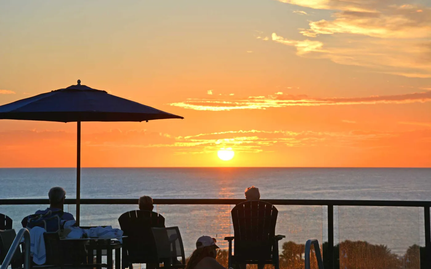 People watching sunset
